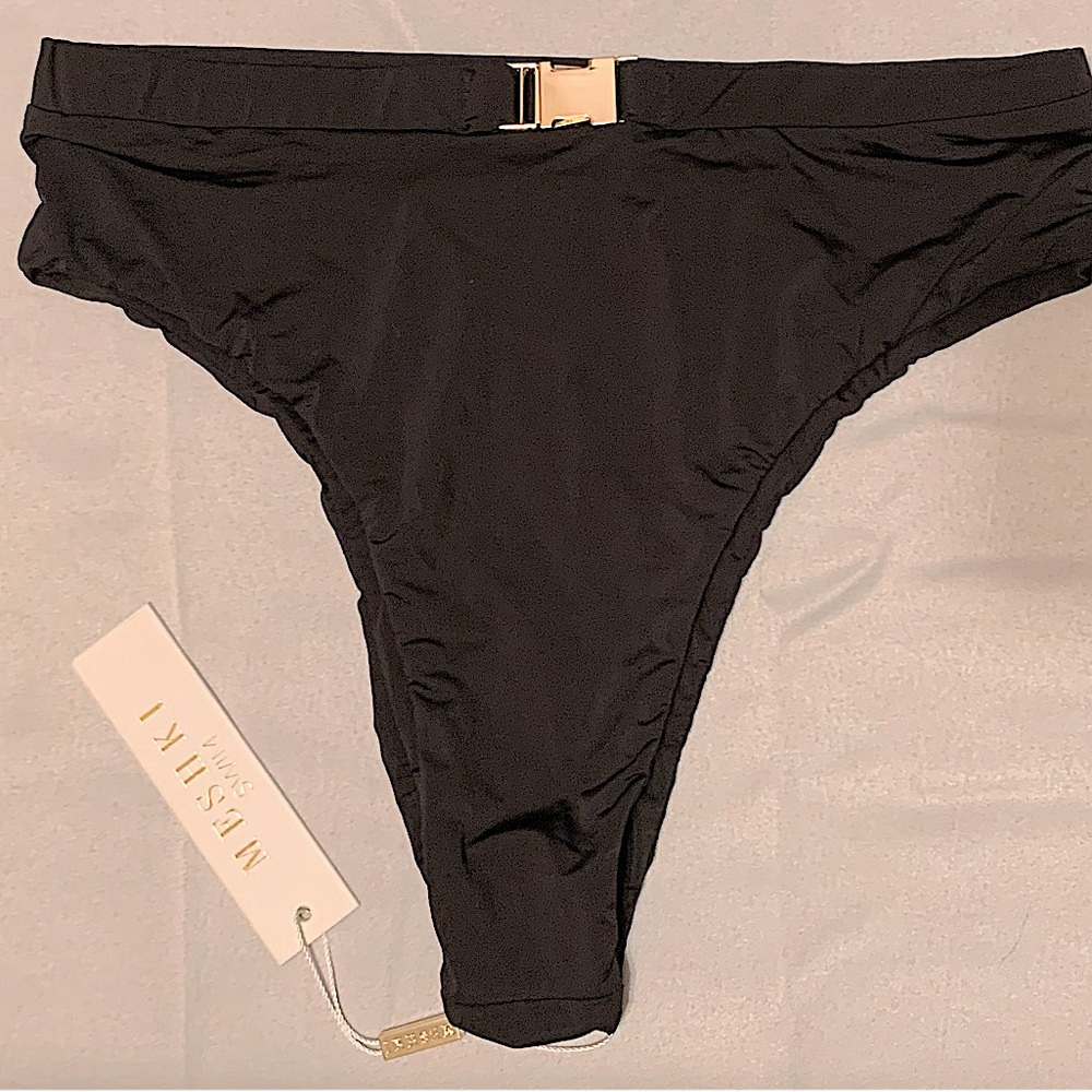 New with Tag Size small black Meshki bikini bottoms with a trendy buckle